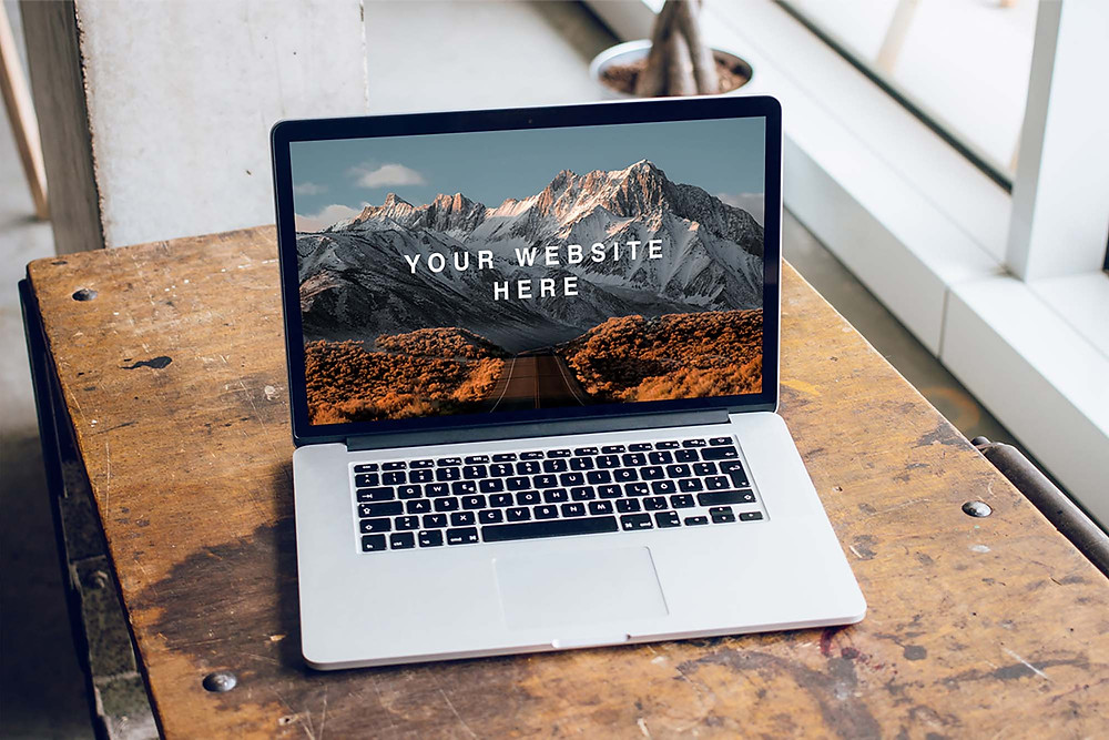 This free mockup template is perfect for showcasing your website design on multiple devices and screens. Free Macbook Pro On Table Mockup Psd